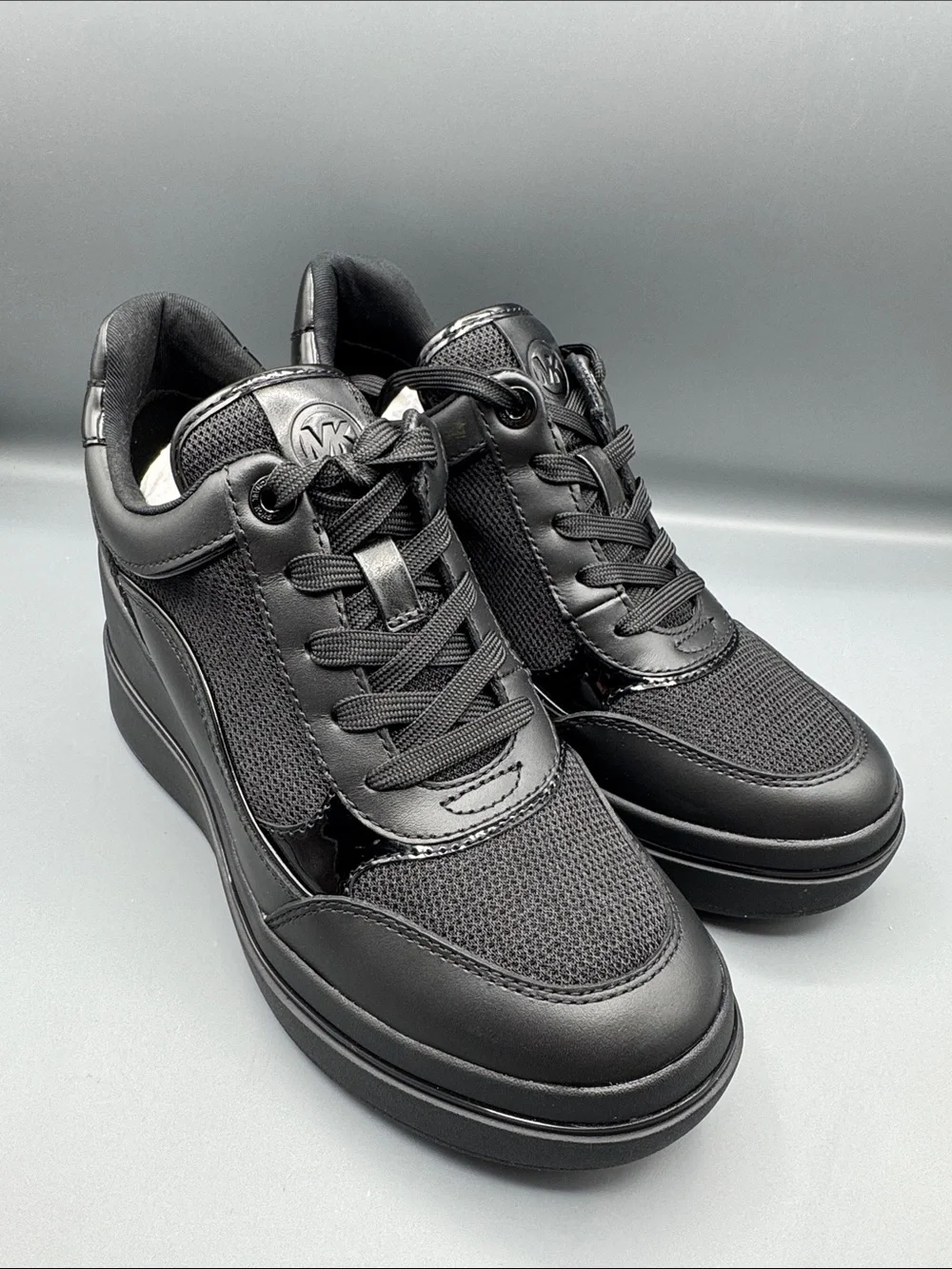 MICHAEL MICHAEL KORS Emmy Leather and Mesh Wedge Trainer